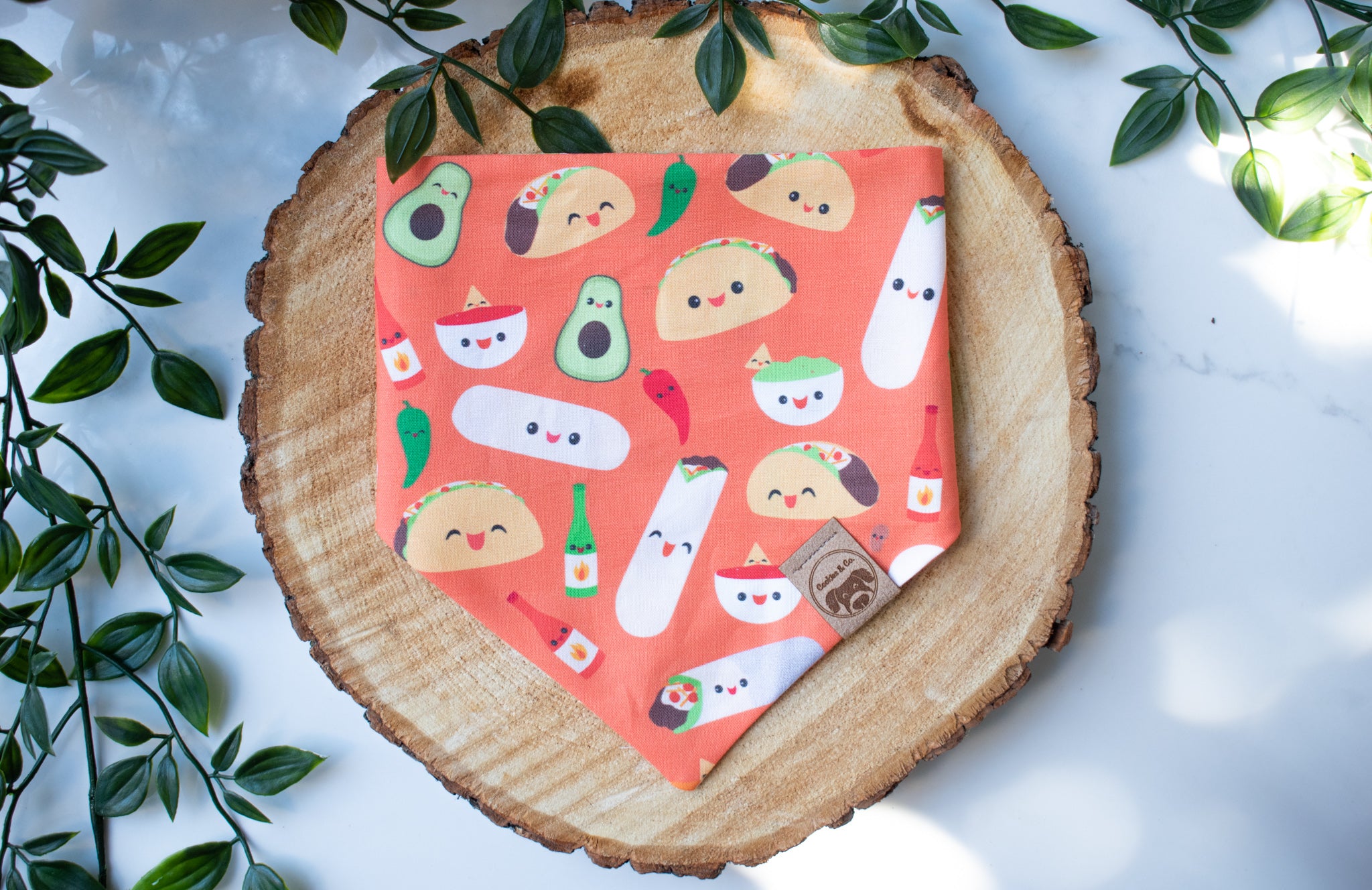 Let's Taco About It dog bandana with snap buttons featuring tacos, burritos, guacamole.