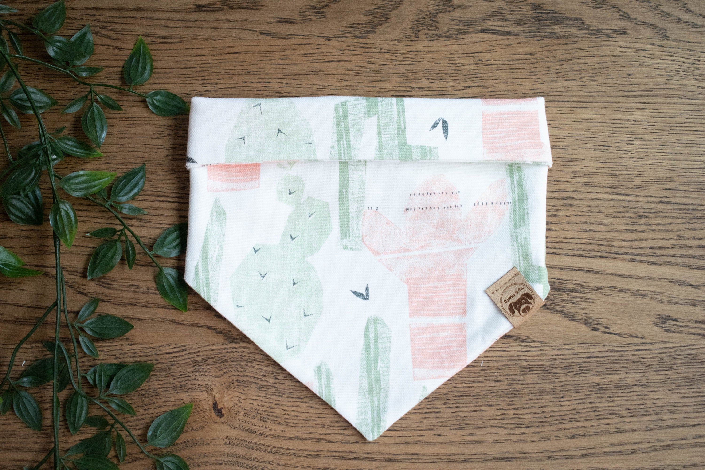 Sunkissed Cactus bandana print, featuring large cacti of different shapes and sizes on a white background
